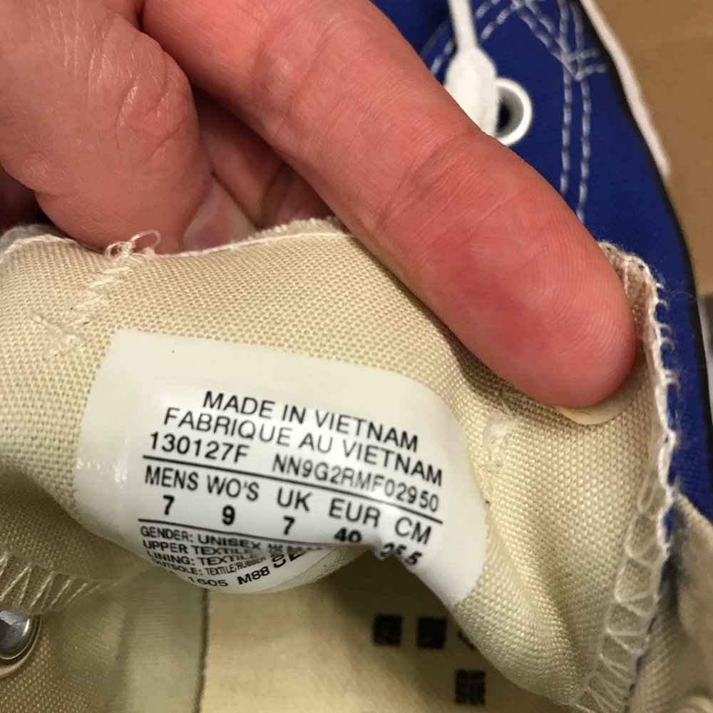 Blue hi-top converse